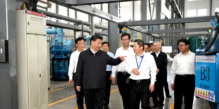 Xi Jinping and Liu He at rare earth factory May 2019
