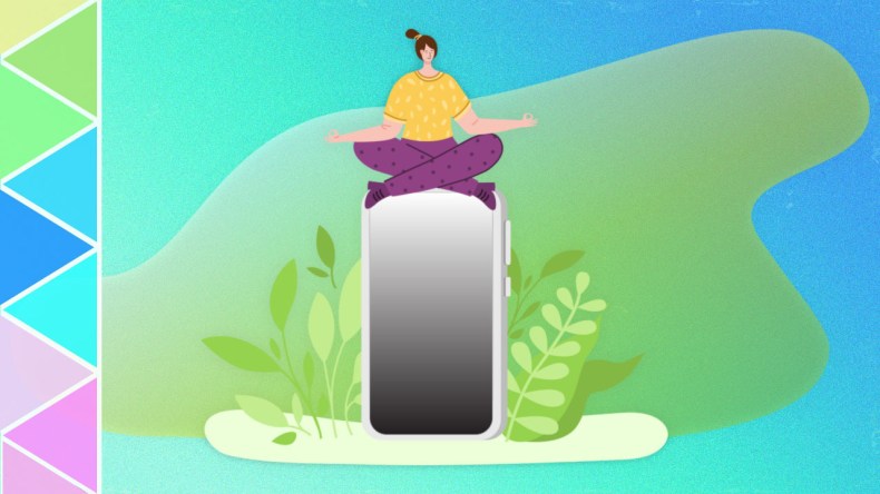 Person meditating on top of a phone
